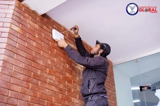 A WAQIA unit being mounted on a campus wall
